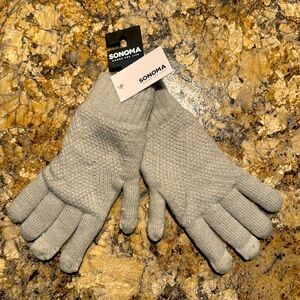 Gray hand stitched gloves